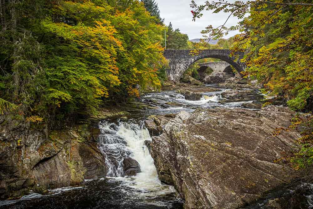 The water flowing under Invermoriston Bridge