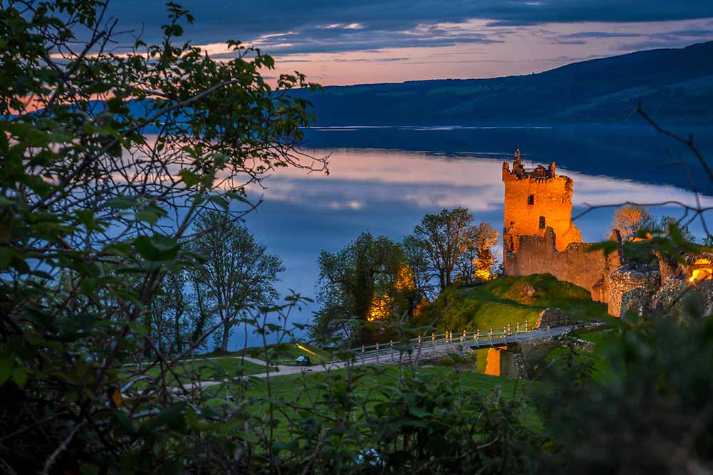 urquhart castle lit up at night